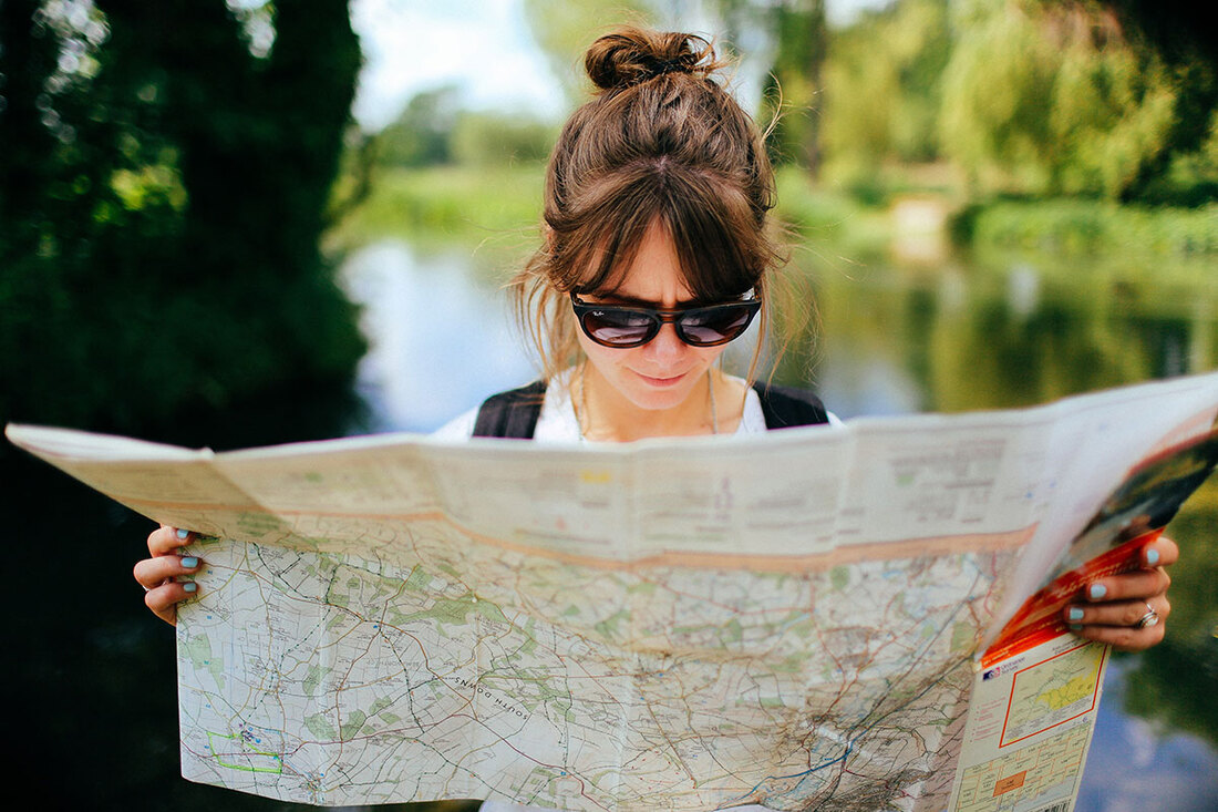 Young woman looking at a map